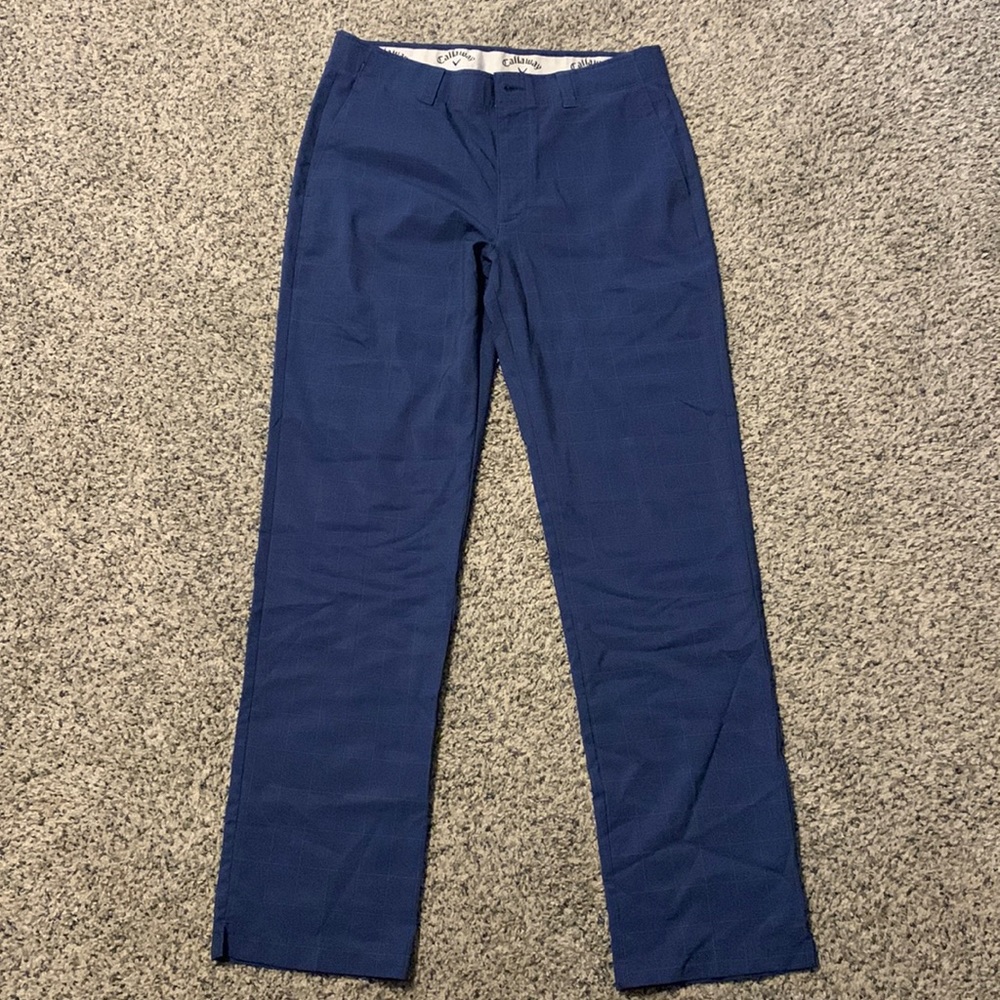 Callaway men’s navy blue with square patterned golf pants. Size 34 x 34.
